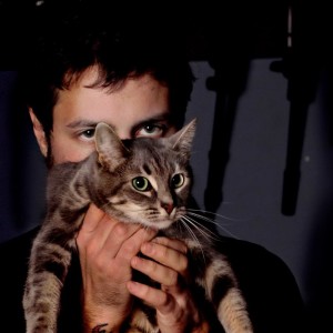 Mike and Vivian, one of his studio cats.