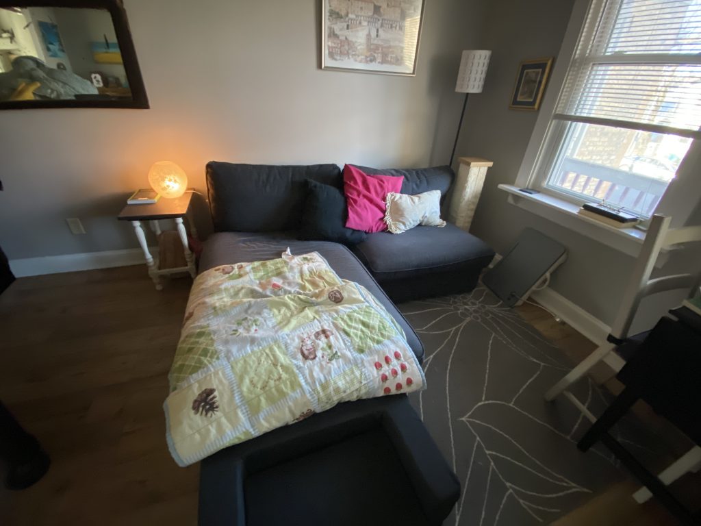 messy blanket on couch